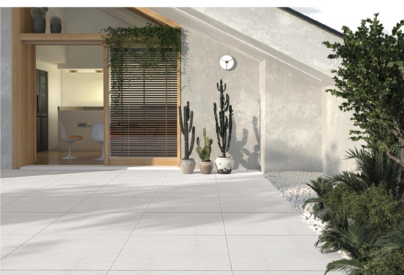 Baltic 60x60 cm pavers on a bright terrace beside a kitchen opening
